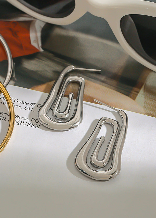 Jieding European and American stainless steel spiral earrings, women's light luxury, high-end earrings, design sense, niche earrings, titanium steel jewelry