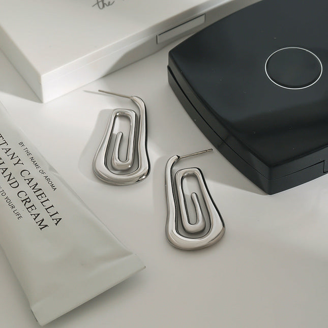 Jieding European and American stainless steel spiral earrings, women's light luxury, high-end earrings, design sense, niche earrings, titanium steel jewelry