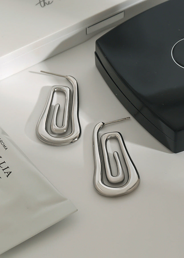 Jieding European and American stainless steel spiral earrings, women's light luxury, high-end earrings, design sense, niche earrings, titanium steel jewelry