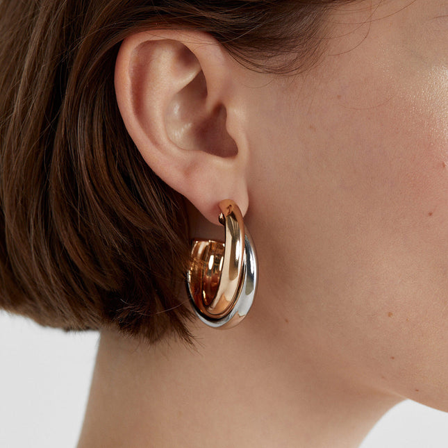 Jieding European and American stainless steel, gold and silver, color-blocked, C-shaped winding studs, high-end personality, temperament earrings, cross-border jewelry