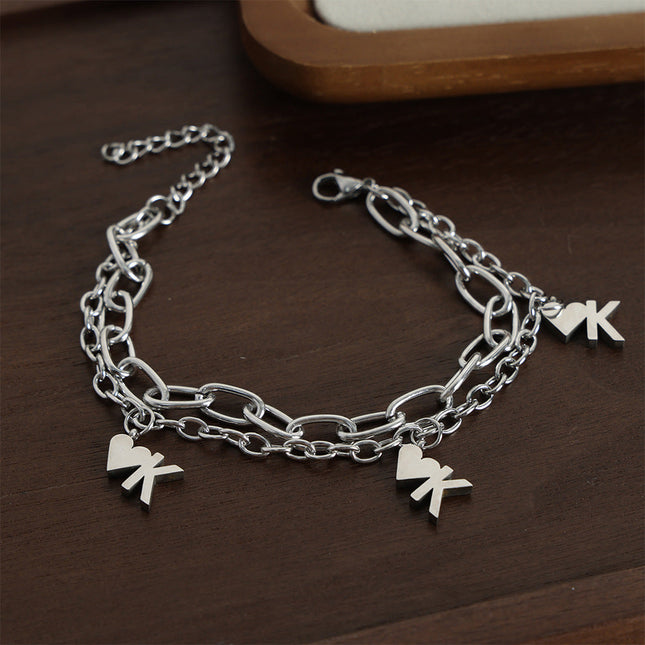 European and American style new fashion cold style personality titanium steel double heart pendant bracelet high-end simple jewelry men