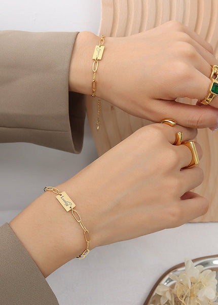 European and American ins cold wind fresh and simple Lucky square brand bracelet titanium steel plated 18K real gold hand jewelry E104