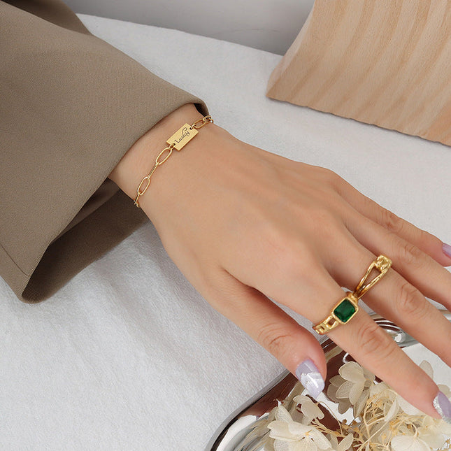 European and American ins cold wind fresh and simple Lucky square brand bracelet titanium steel plated 18K real gold hand jewelry E104