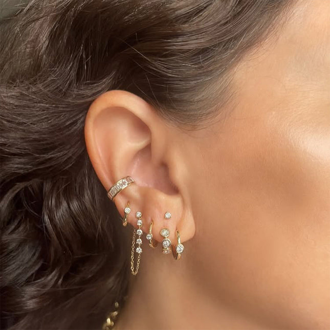 Jieding European and American stainless steel pierced ear clips, high-end rhinestone ear skull clips, titanium steel earrings, cross-border earrings