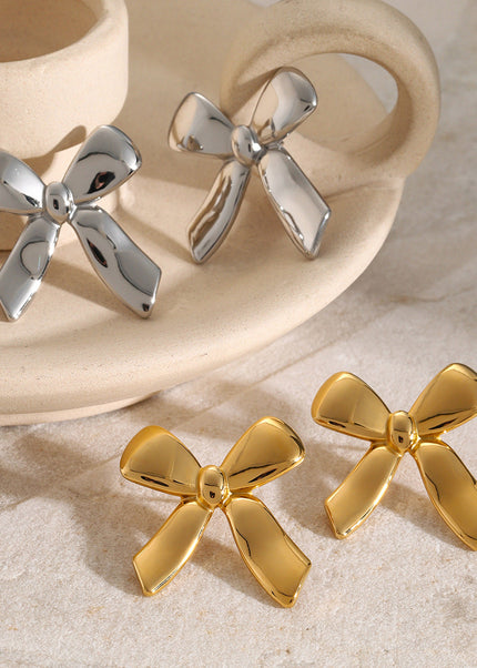 18k gold stainless steel stud earrings with the same glossy bow with a unique design titanium steel earrings