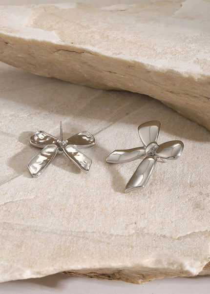 18k gold stainless steel stud earrings with the same glossy bow with a unique design titanium steel earrings