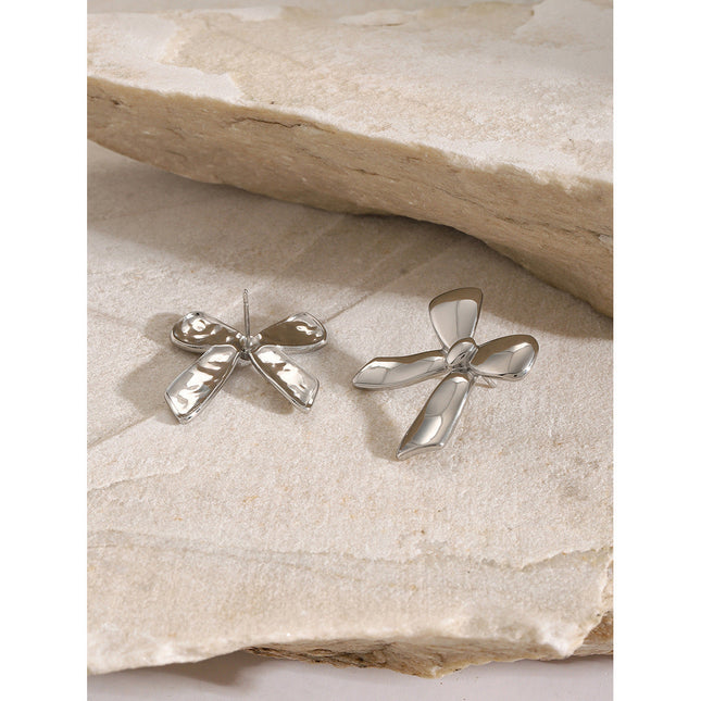 18k gold stainless steel stud earrings with the same glossy bow with a unique design titanium steel earrings