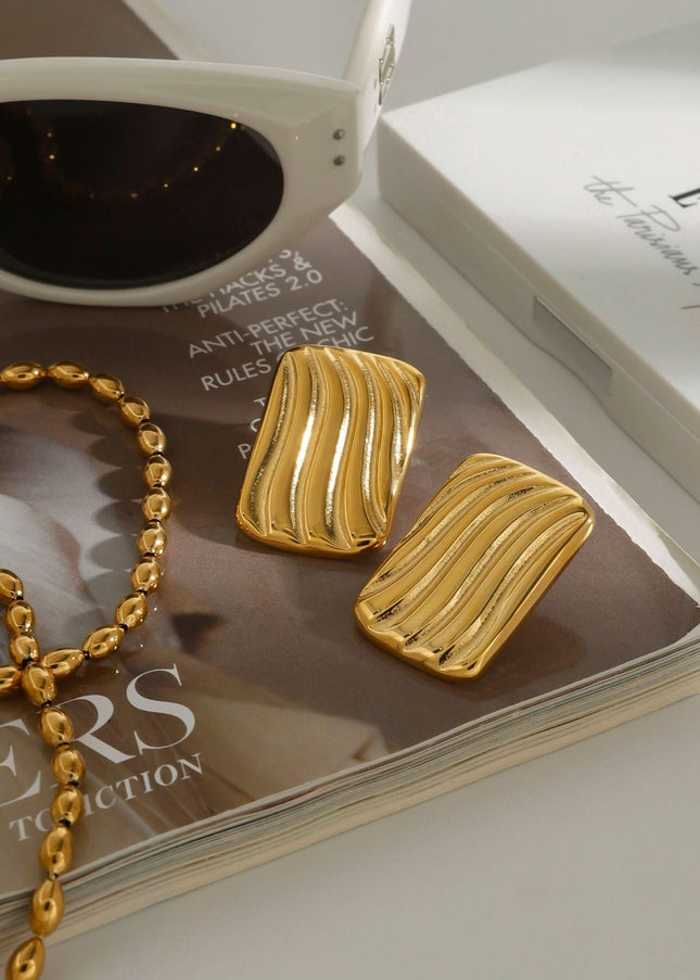 Jieding European and American geometric titanium steel stud earrings, light luxury, high-end earrings, non-fading jewelry, stainless steel cross-border women