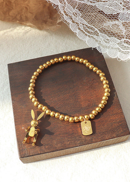 European and American ins light luxury style simple rabbit titanium steel bracelet plated 18k gold fashion elastic rope bead bracelet E024