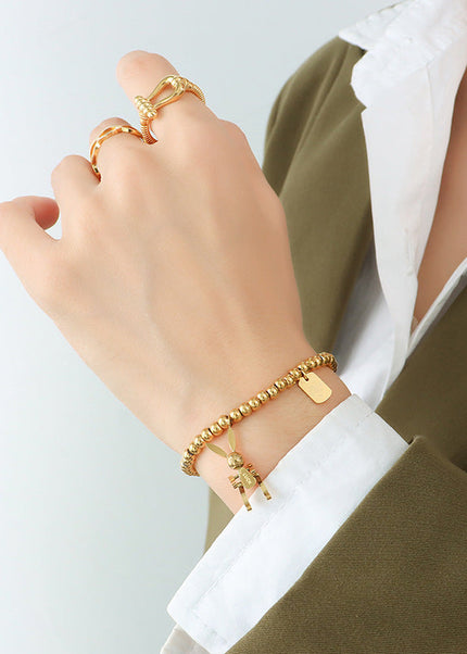 European and American ins light luxury style simple rabbit titanium steel bracelet plated 18k gold fashion elastic rope bead bracelet E024