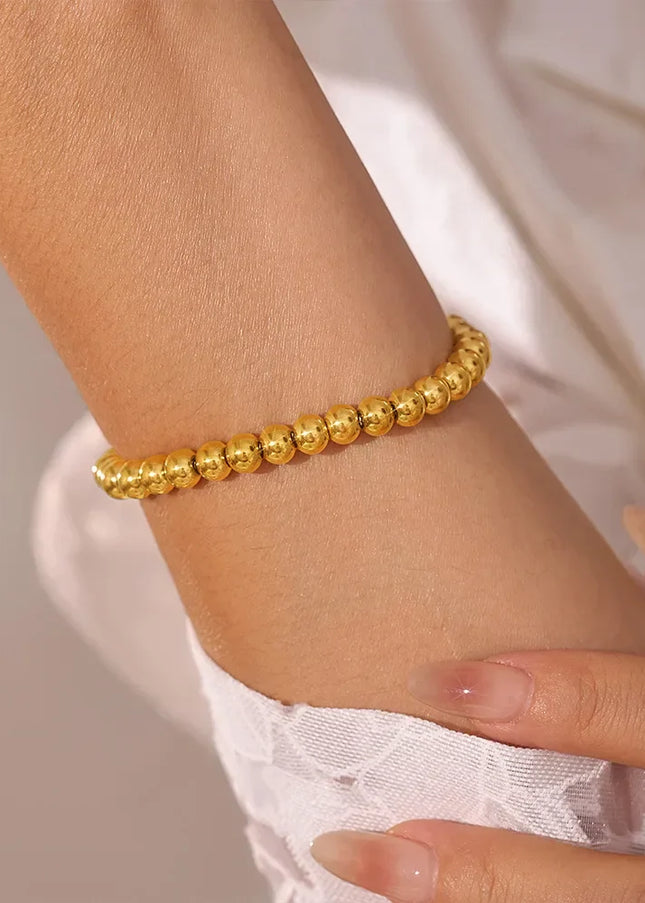 European and American style titanium steel bead bracelet gold ladies minimalist metal texture bead pull-back buckle bracelet cross-border jewelry