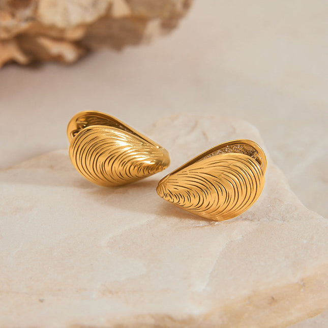 Jieding European and American stainless steel holiday earrings, light luxury, high-end earrings, niche design, studs, titanium steel jewelry, cross-border