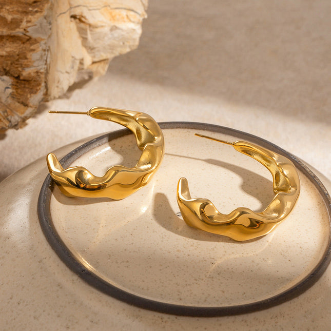 Jieding European and American stainless steel double c earrings luxury niche 18k gold stud earrings titanium steel color-retaining earrings cross-border