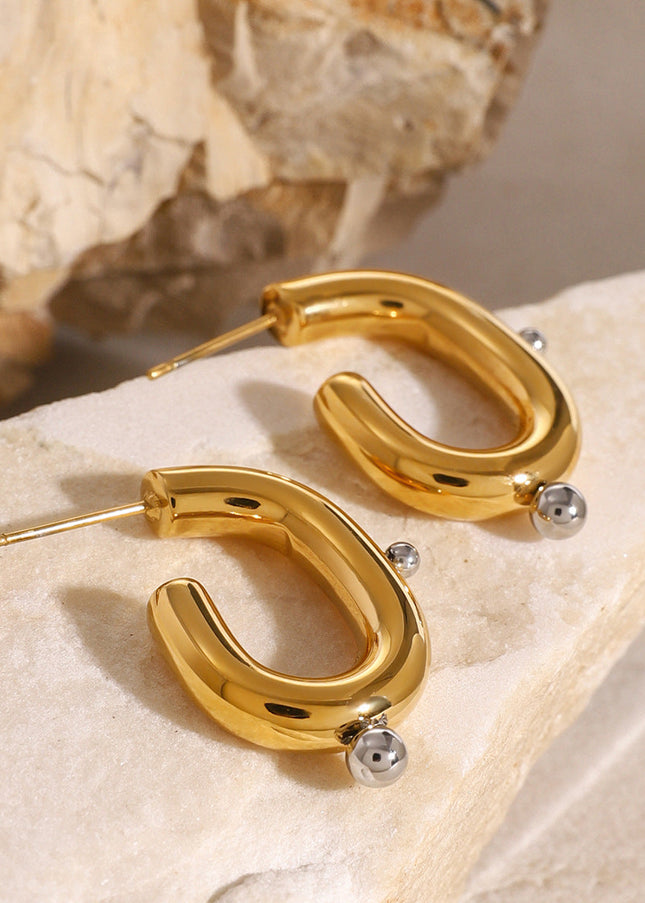 Jieding European and American stainless steel pearl earrings, exaggerated earrings, high-end sense of ins jewelry, electroplated titanium steel earrings, cross-border