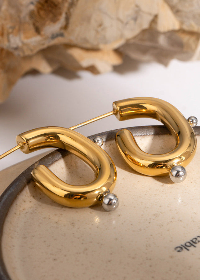 Jieding European and American stainless steel pearl earrings, exaggerated earrings, high-end sense of ins jewelry, electroplated titanium steel earrings, cross-border