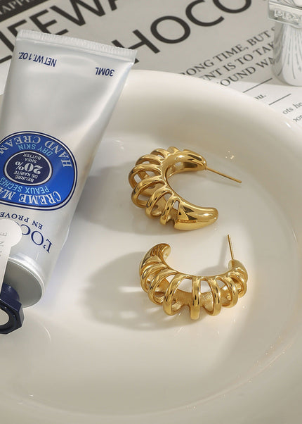 Jieding Europe and America 18k hollow titanium steel earrings light luxury high-end earrings do not fade ear jewelry stainless steel cross-border