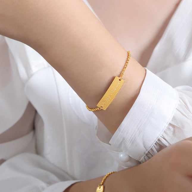 European and American fashion personality long bend brand English letters simple niche design titanium steel does not fade bracelet jewelry wholesale