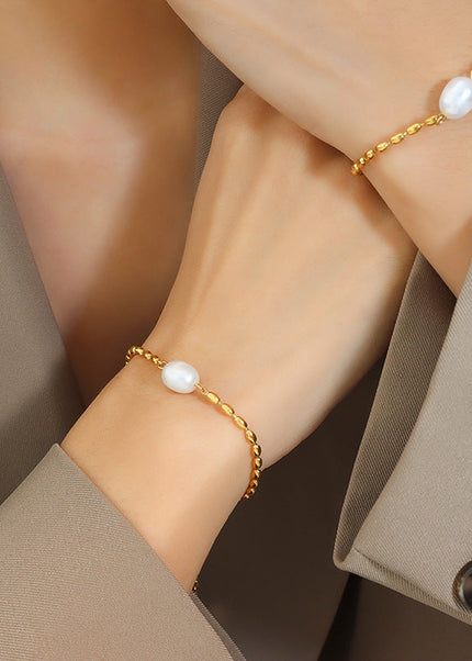 Korean freshwater pearl splicing, rice bead temperament, metal chain bracelet, neutral style, personality and non-fading girlfriend hand ornament