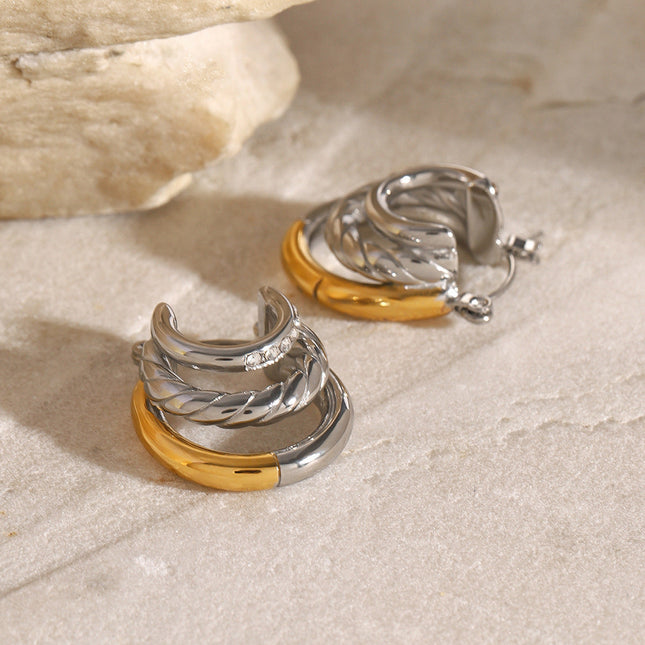 Jieding European and American stainless steel contrast double C earrings high-end niche ins stud earrings 18K titanium steel earrings cross-border