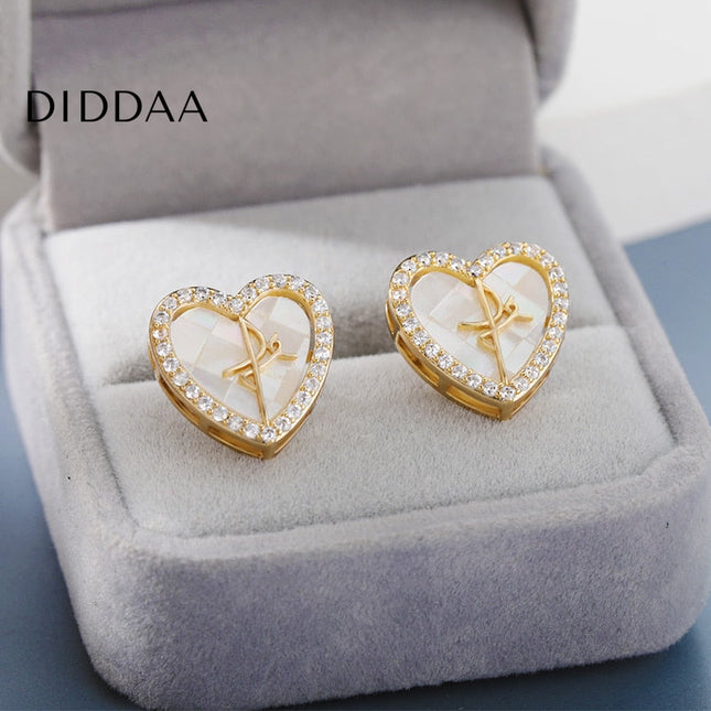 Canelle Earrings | Gold Hollow Heart Zirconia Stud Earrings - Earrings