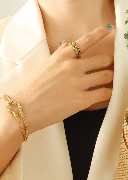 Korean ins cross geometric knotted bracelet women's niche design sense titanium steel gold-plated non-fading hand jewelry