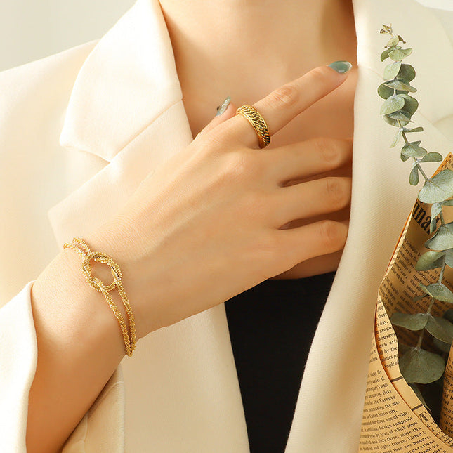 Korean ins cross geometric knotted bracelet women's niche design sense titanium steel gold-plated non-fading hand jewelry