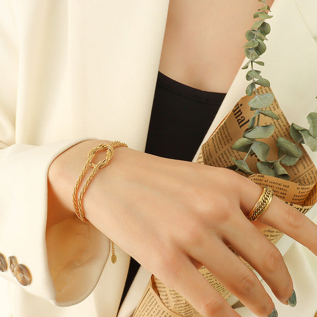 Korean ins cross geometric knotted bracelet women's niche design sense titanium steel gold-plated non-fading hand jewelry