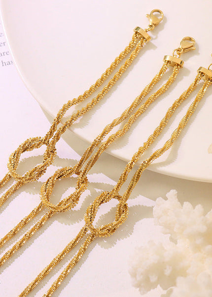 Korean ins cross geometric knotted bracelet women's niche design sense titanium steel gold-plated non-fading hand jewelry