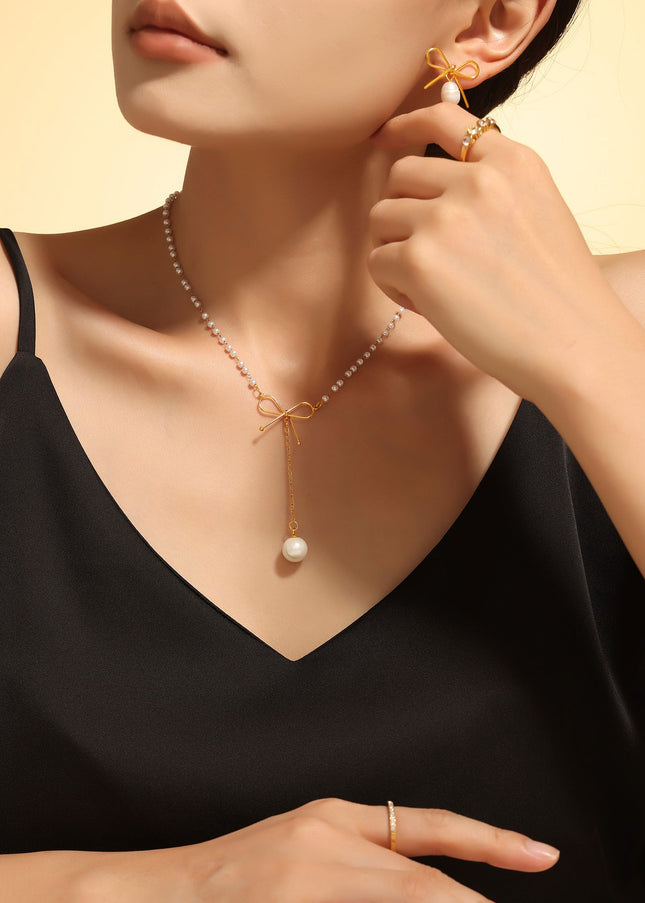 Fairy choker bow imitation pearl necklace ins cold style temperament simple luxury stainless steel clavicle chain