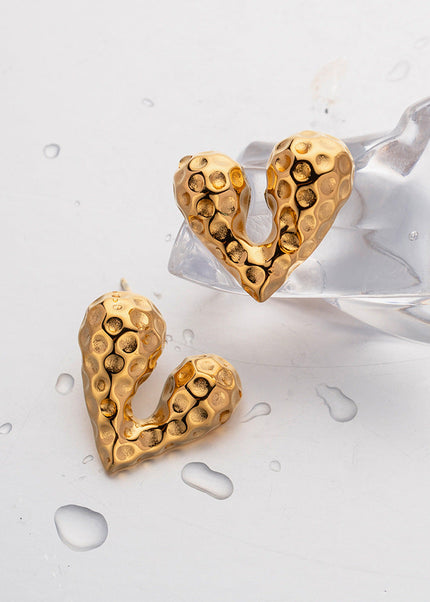 European and American Internet celebrity pop earrings 18K gold stainless steel personality liquid love heart shaped stud earrings design sense earrings wholesale