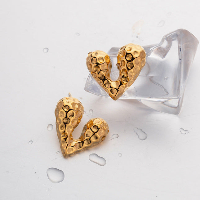 European and American Internet celebrity pop earrings 18K gold stainless steel personality liquid love heart shaped stud earrings design sense earrings wholesale