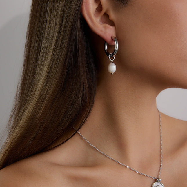 Jieding European and American stainless steel pearl earrings, light luxury, high-end earrings, non-fading jewelry, titanium steel jewelry, cross-border women