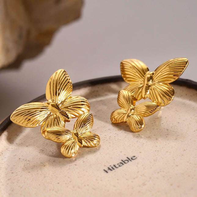 Jieding European and American stainless steel exaggerated earrings, butterfly stud earrings, high-end earrings, 18k gold titanium steel jewelry, cross-border
