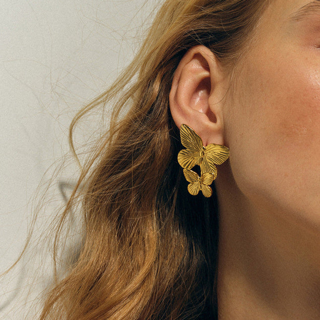 Jieding European and American stainless steel exaggerated earrings, butterfly stud earrings, high-end earrings, 18k gold titanium steel jewelry, cross-border