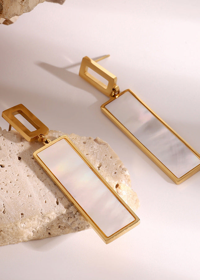 Jieding European and American stainless steel shell pendant stud earrings high-end temperament earrings 18k gold titanium steel earrings cross-border