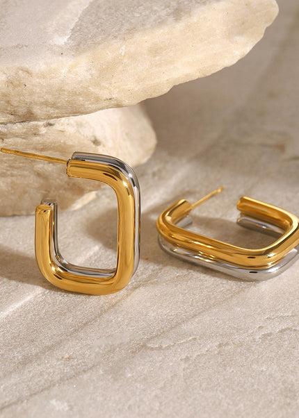 Jieding European and American stainless steel contrasting round earrings high-end niche stud earrings 18k gold titanium steel earrings cross-border