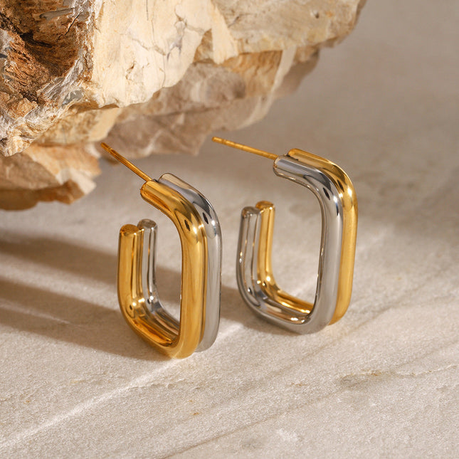 Jieding European and American stainless steel contrasting round earrings high-end niche stud earrings 18k gold titanium steel earrings cross-border