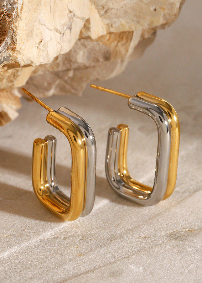 Jieding European and American stainless steel contrasting round earrings high-end niche stud earrings 18k gold titanium steel earrings cross-border