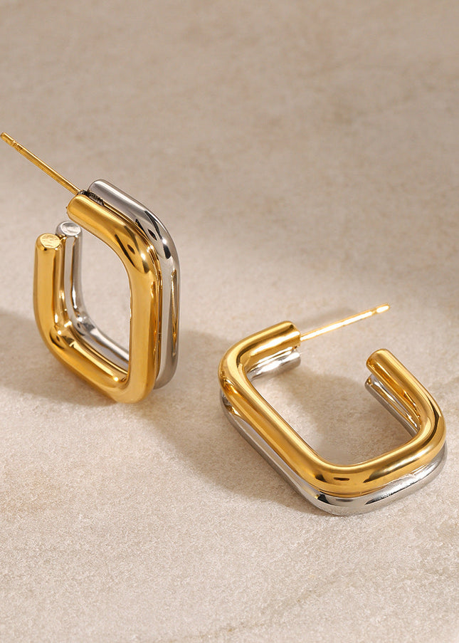 Jieding European and American stainless steel contrasting round earrings high-end niche stud earrings 18k gold titanium steel earrings cross-border