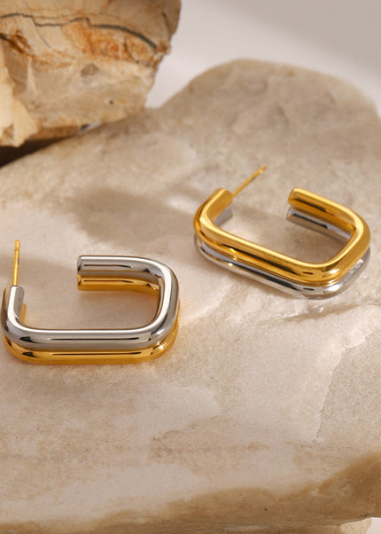 Jieding European and American stainless steel contrasting round earrings high-end niche stud earrings 18k gold titanium steel earrings cross-border