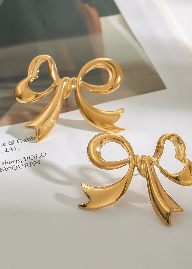 Jieding European and American bow titanium steel stud earrings stainless steel earrings light luxury high-end earrings cross-border earrings