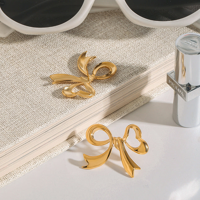 Jieding European and American bow titanium steel stud earrings stainless steel earrings light luxury high-end earrings cross-border earrings