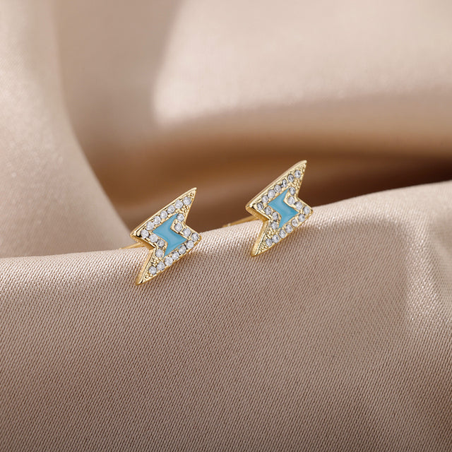 SOUVOIR Blue 14K Gold Plated, Zirconia Earrings Spark Earrings | Gold White Zirconia Lightning Bolt Stud Earrings