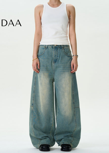 Washed Blue Distressed Loose Scimitar Jeans for Men and Women - S / Mid Blue - Men’s Jeans