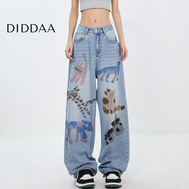 White Graffiti Kitten Print Wide-Leg Jeans for Women - S / Mid Blue - Women’s Jeans